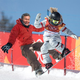Chloe Kim and her father on a snowboard